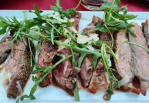 Tagliata di manzo con rucola e parmigiano ricetta in padella