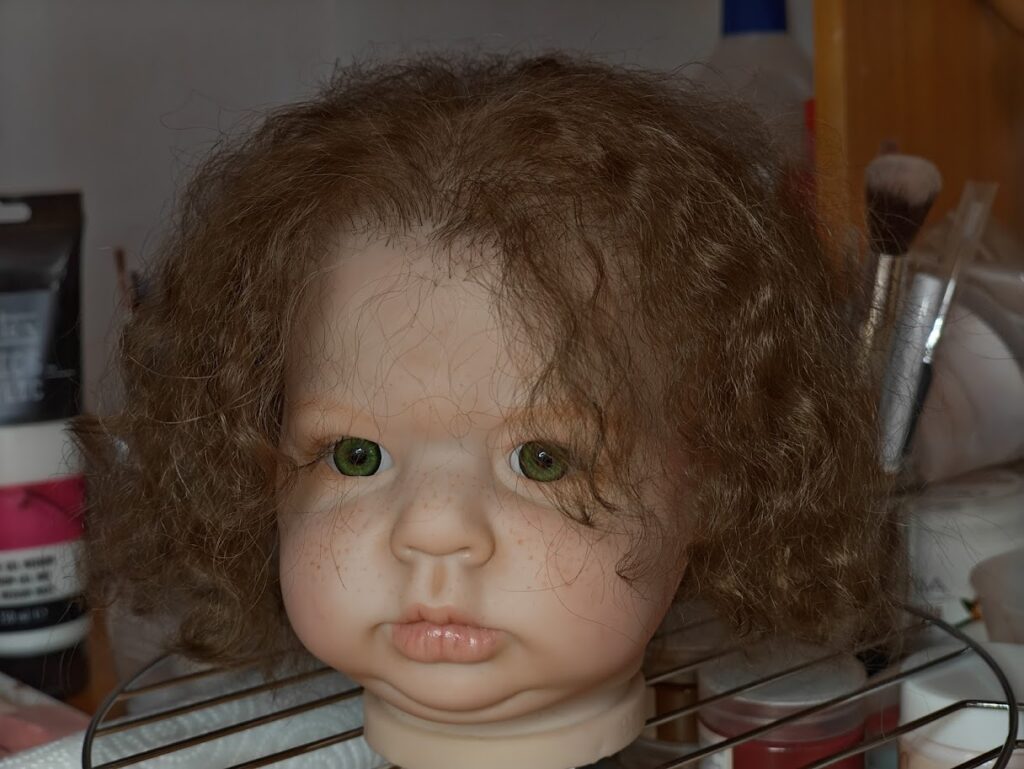 reborn testa dipinta