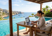 Workation: il lavoro a bordo piscina promette di essere tra i trend anche nell’estate 2026 workation il lavoro a bordo piscina